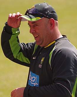 A man wearing the Australian training jersey and wearing a cap