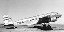 TWA DC-2 airplane parked on airport's concrete apron