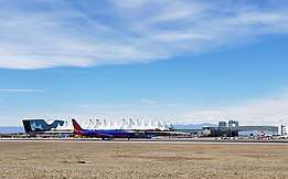 A Southwest Airlines Boeing 737-800 taxis north at Denver International Airport