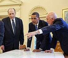 Oaks pointing to President Obama's family history with Thomas S. Monson.