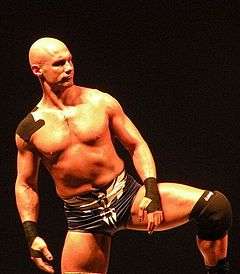 Christopher Daniels posing in a wrestling ring