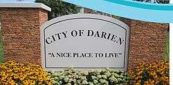 Monument sign advertising the Darien as a "nice place to live."
