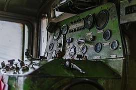 Green control panel, with many gauges