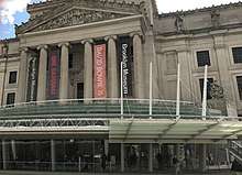 A view of the Brooklyn Museum in New York flying a David Bowie Is banner