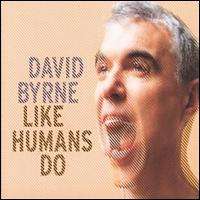A pixelated picture of David Byrne's face with him screaming