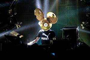 DJ with a mouse head mask performing live