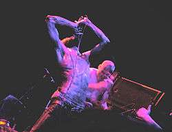MC Ride and Zach Hill are seen performing live.