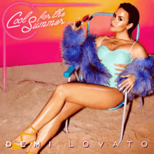 A picture of a woman wearing a light blue swimsuit with cutouts on the cover, a purple fur coat and yellow heels. She is sitting in a beach chair in the sand while holds her sunglasses in her hand. Her black hair is slicked back. She is over a pink background. The cover also features the title of the song ("Cool for the Summer") in Italic letters while the name of the singer (Demi Lovato) is shown under her image.