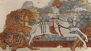 A knight riding a horse and taking a lance