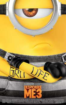 A minion in a black-and-white striped clothing, with a tattoo that reads "GRU LIFE" around his arms.