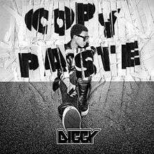 The cover is in black and white with the song title shown in strands of paper. The artist appears behind the song title sitting down with his logo appearing below him.