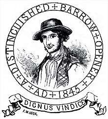Ink drawing: Circular seal with a self portrait of Frederick William Lock in center; "A Distinguished Barrow Digger, 1845" written in its outer ring; and a ribbon beneath the seal written in Latin: "Dignus Vindice" (Worthy Protector)