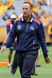 Don Pyke in 2017 as senior coach of the Adelaide Football Club, US born games record holder and first US born AFL premiership player