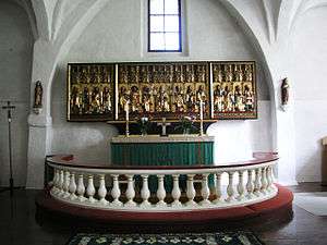 Interior view of the church with the altarpiece from 1512