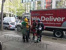SkyMan, Red Ranger, El Caballero, and Dragon (members of Emerald City Heroes Org, or ECHO) monitoring the 2017 May Day protests in Seattle.