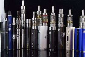 Displaying a variety of e-cigarettes standing next to each other
