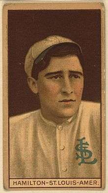 A sepia-toned baseball card image of a man in a white baseball uniform with an interlocking "StL" on the left breast