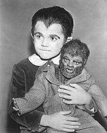 Eddie Munster with his werewolf doll "Woof-Woof"