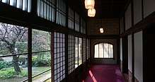 A wide photograph of a hallway from the Takahashi Korekiyo residence in the Edo-Tokyo Open Air Architectural Museum, which was one of Miyazaki's inspirations in creating the spirit world's buildings.
