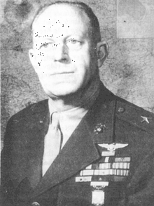 A black and white image of the upper torso and head of Merritt Edson in his military dress uniform with ribbons.