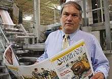 Edwin Grosvenor supervises the printing of American Heritage Magazine