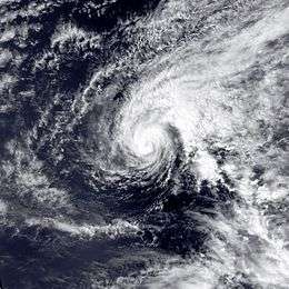 A small, intense hurricane in the middle of the Pacific Ocean.