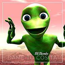 In a reddish, rocky habitat, a green alien is shown with its arms stretched out, dancing. An outline of a square surrounds the screen. Inside the bottom half of the square, El Chombo's name is written in cursive, and below that, "Dame Tu Cosita", is shown in a sans-serif font.