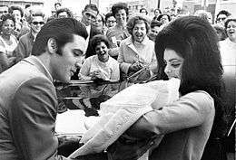 Elvis and Priscilla with newborn Lisa Marie