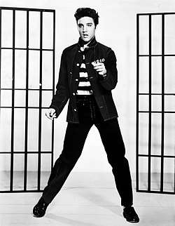 Black-and-white publicity photograph of Elvis Presley from the film Jailhouse Rock.