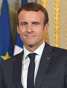 A smiling Emanuel Macron