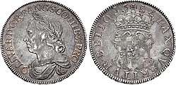 Photo of a 1658 silver Crown coin featuring Oliver Cromwell