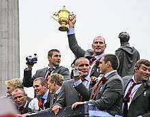 England rugby union team celebrating with the World Cup