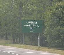 A sign stating "Welcome to Connecticut and the Merritt Parkway"