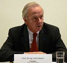 Erich Barke, at a desk