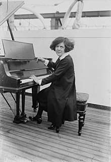 Ethel Leginska sitting at a piano