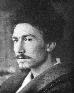 a 1913 headshot of Ezra Pound