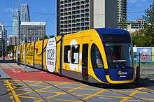 Yellow-and-blue tram