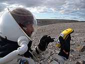 Vernon Kramer uses a Trimble GeoXM GPS to locate the Gemini Hills on EVA 9.
