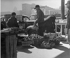 Farmers unload produce at City Market, Kansas City, Mo., c. 1950