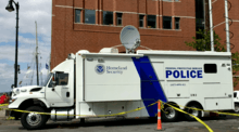 A Federal Protective Service communications vehicle protecting the John Joseph Moakley United States Courthouse during Sail Boston 2017.