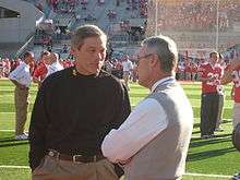 Iowa coach Kirk Ferentz and Ohio State coach Jim Tresseltalk on the field before their teams played on November 14, 2009.