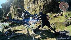 In a sunlit valley, a black-clothed man fights an armored figure.
