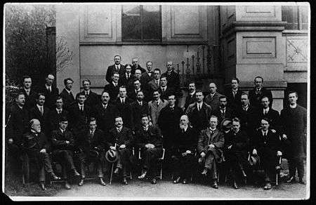 Fr. Michael O'Flanagan, standing to the right, was chaplain to the First Dáil pictured in April 1919.