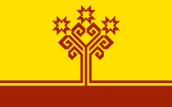 Flag with a stylized red tree on a gold background