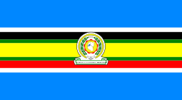 Nine horizontal strips coloured (from top to bottom): blue, white, black, green, yellow, green, red, white, then blue. The emblem of the EAC is placed in the centre.