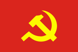 a red flag; at the center of it there is a hammer and a sickle, a communist symbol