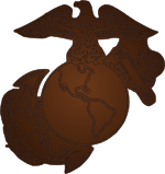 Bronze eagle atop globe covering anchor