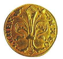 A golden coin depicting a lily