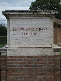 Stone pillar with plaque denoting name of cemetery.