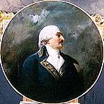 Painting of a black-moustached man in a white 18th century wig. He wears a blue 1790s style military coat with gold trim.